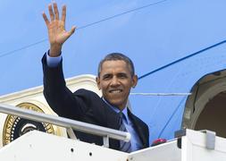 Obama sube al Air Force One. / Saul Loeb (Afp)