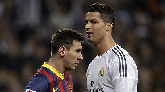 Messi (i) y Cristiano, durante un partido de Liga. 