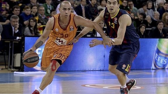 Carlos Arroyo (i), durante un partido con el Barça. 