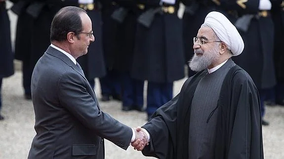François Hollande saluda a Hasán Rohaní. 