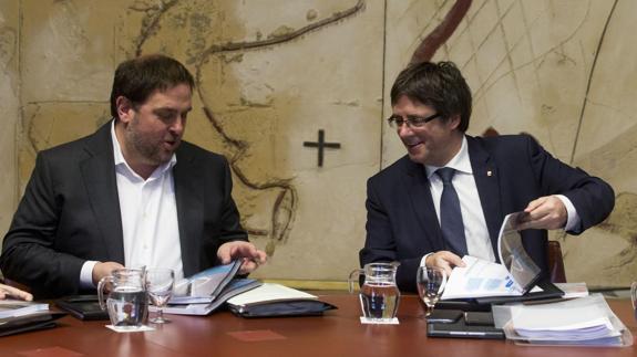 Oriol Junqueras y Carles Puigdemont.