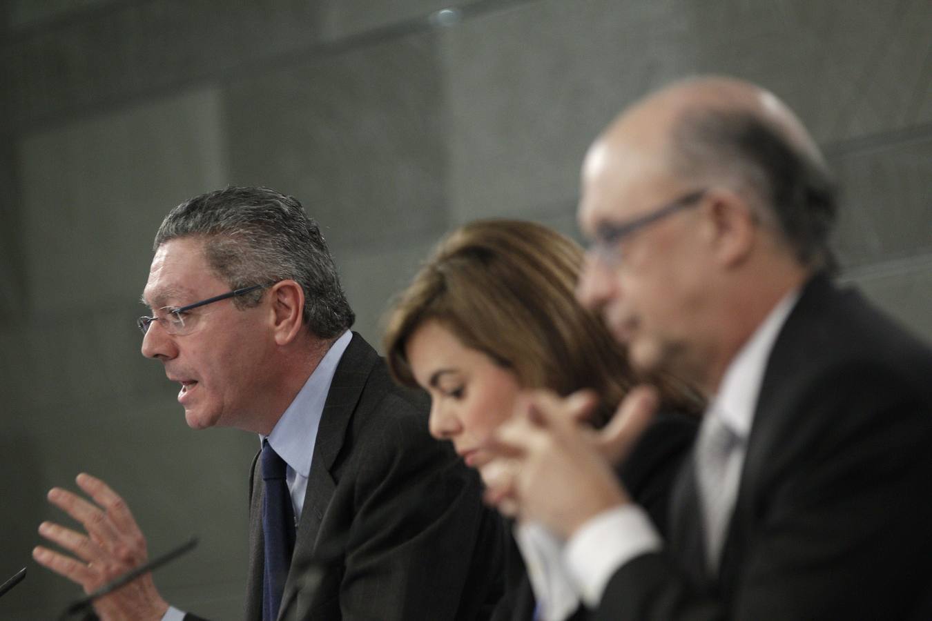 Alberto Ruiz-Gallardón, Soraya Sáenz de Santamaría y Cristóbal Montoro. 