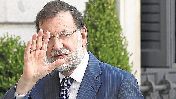 El presidente Rajoy, ayer, a su llegada al Congreso.