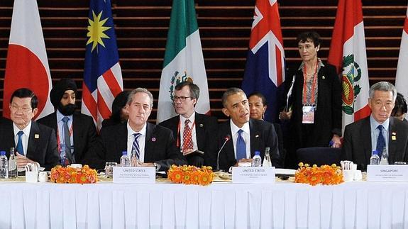 Obama, en el centro, junto a algunos líderes de los países incluidos en el histórico acuerdo. 