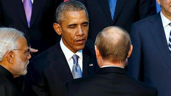 Obama y Putin se saludan en la cumbre del G-20. 
