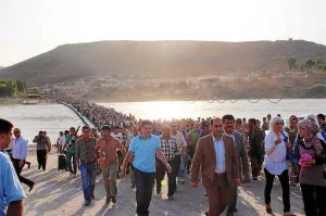 Miles de refugiados sirios en la región del Kurdistán iraquí. / AFP