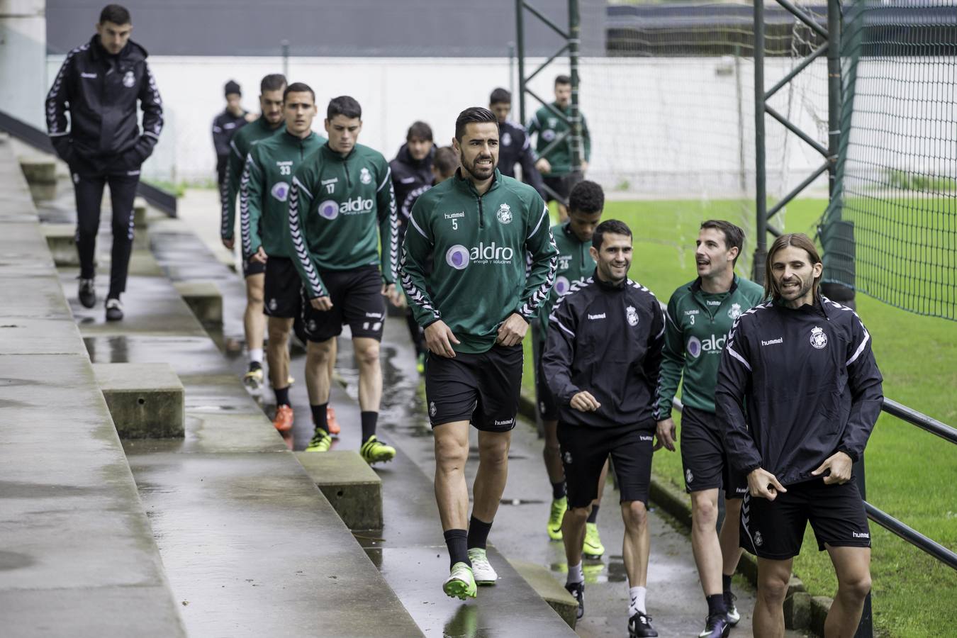 Entrenamiento del Racing bajo la lluvia