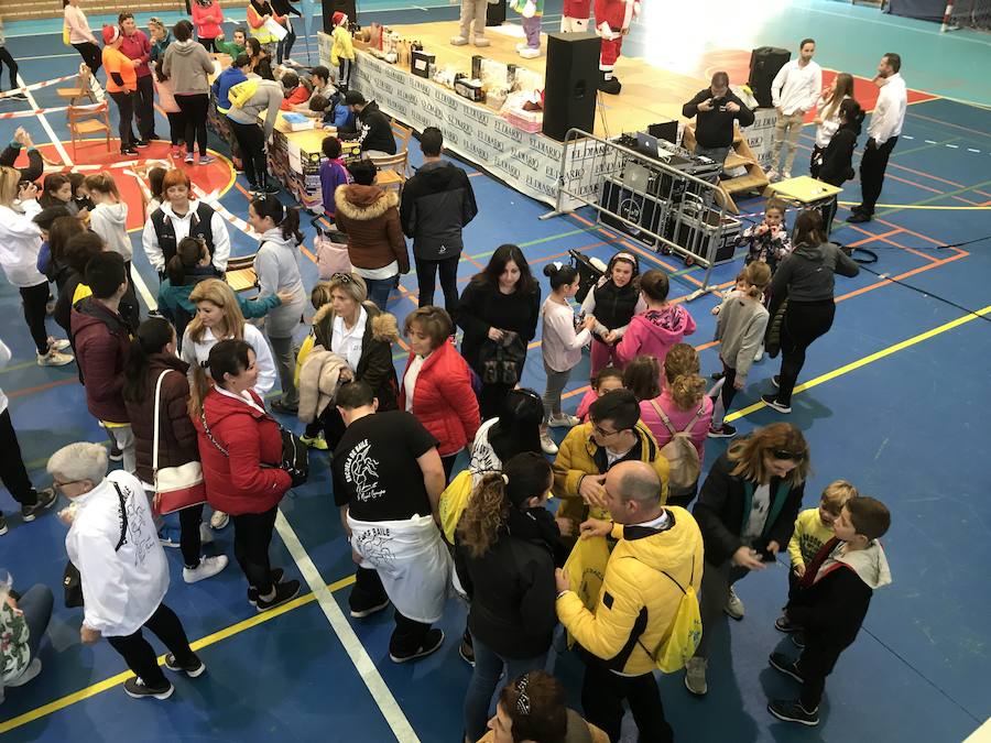 Los vecinos han participado esta mañana en una marcha a favor de la asociación 'Buscando Sonrisas'