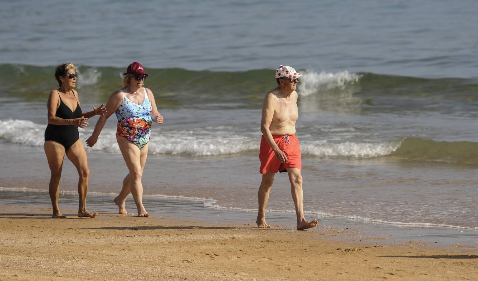 Fotos: El sol y el calor llenan las playas