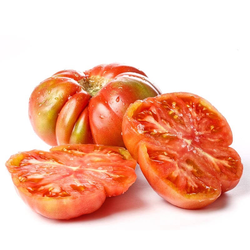 Tomate feo de Tudela. Procente de la Ribera de Navarra, es un tomate de piel fina, de un intenso color rojo que destaca, sobre todo, por su textura jugosa y su poderoso e inolvidable sabor. de la variedad 'marmande'.