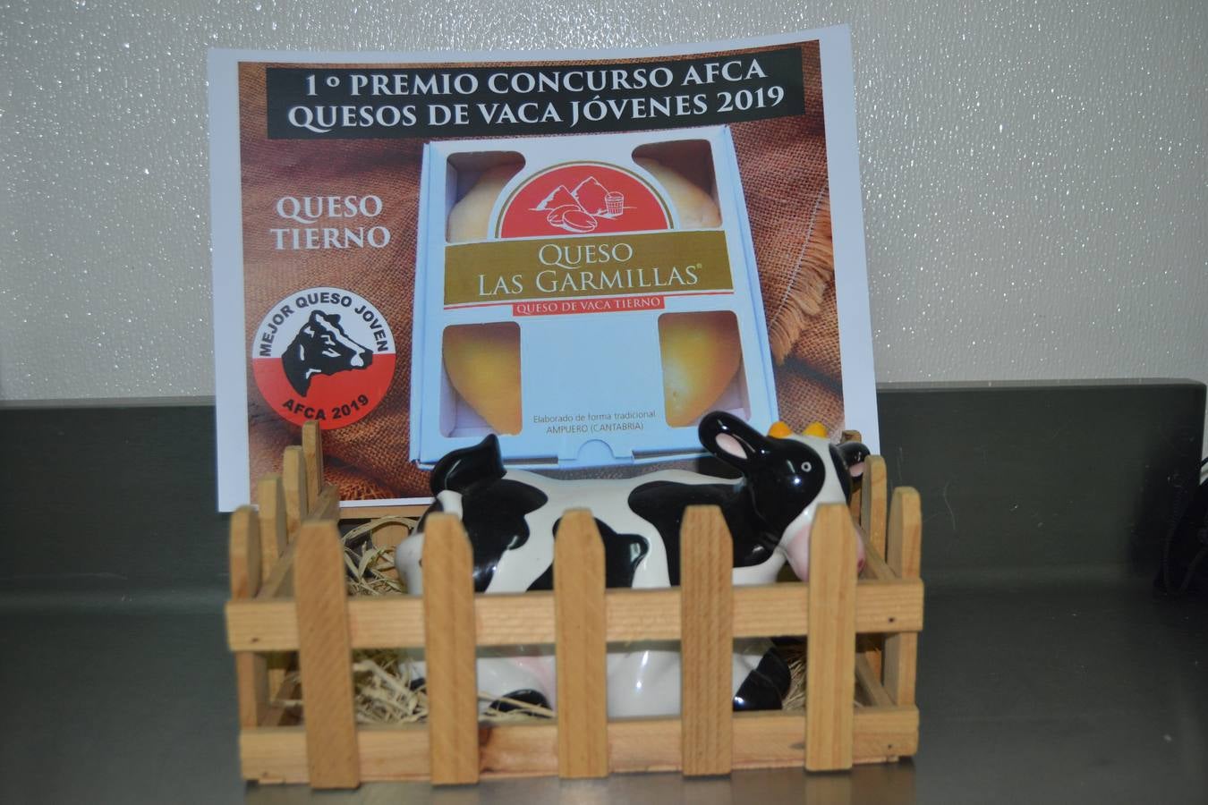 Roberto Hoyo, junto con sus padres Milagros Lombera y Feliciano Hoyo. 