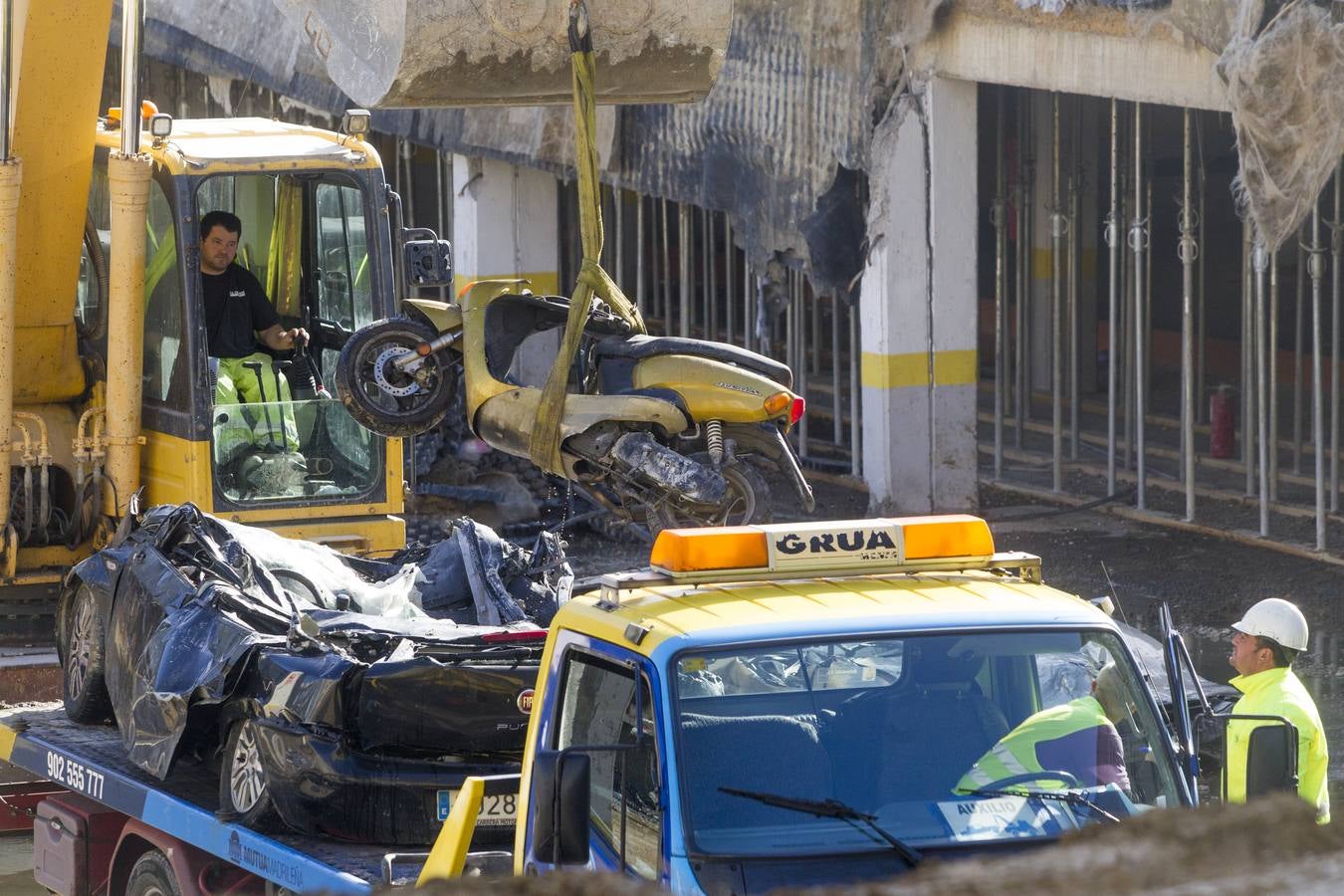 Fotos: Retirada de escombros y coches en Nueva Montaña