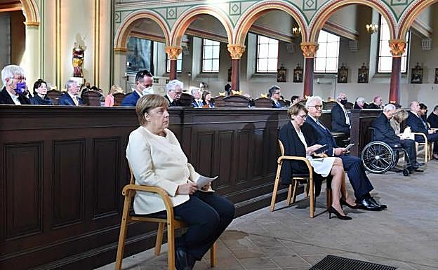 Angela Merkel y Frank Walter Steinmeier, en la ceremonia del día de la reunificación alemana 