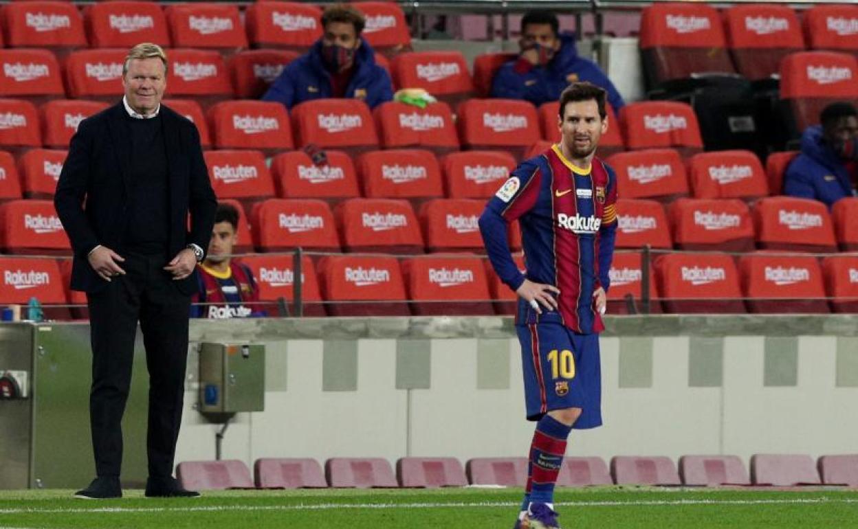 Ronald Koeman y Messi, durante el partido ante el Valencia. 