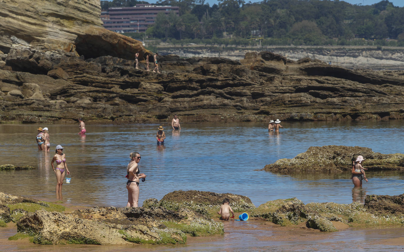 Fotos: El buen tiempo llena las playas