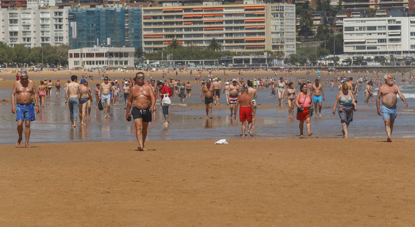 Fotos: El buen tiempo llena las playas