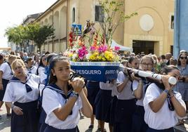 Tradicional procesión por las calles del barrio, en 2022.