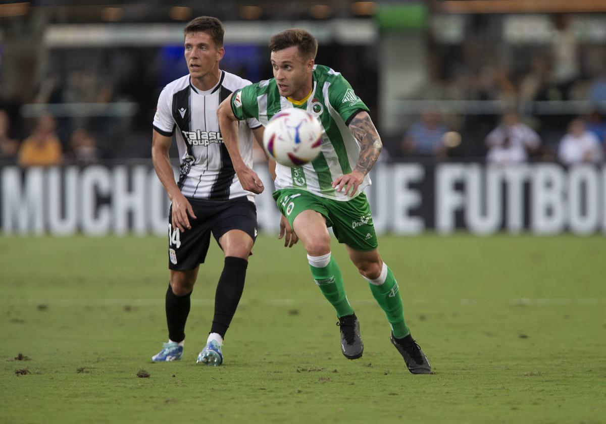 Dani Fernández, junto a Fontán, en un lance del encuentro.