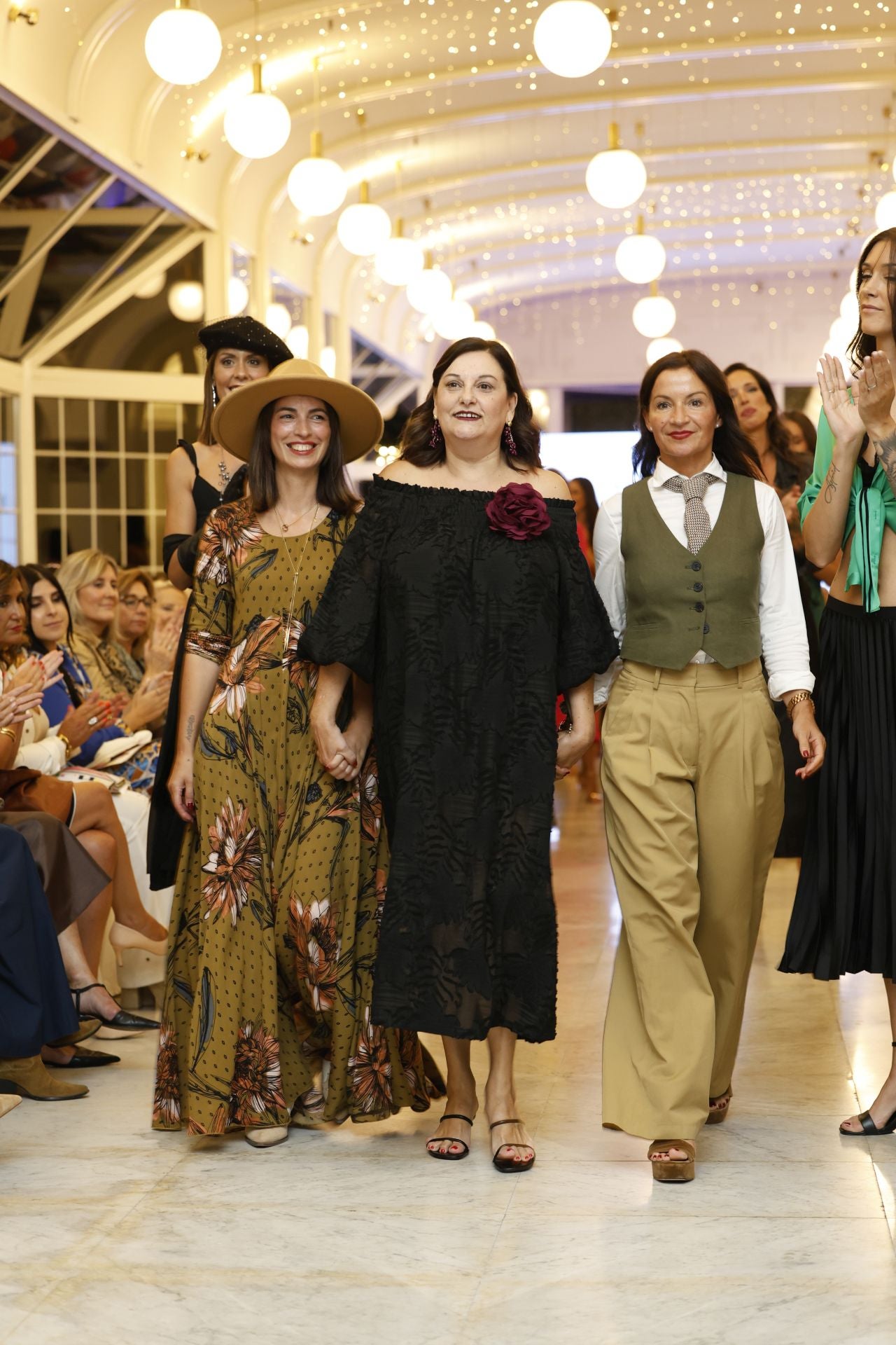 Lss estilistas cántabras Mar Zorrilla, Maribel Cabo y Susana Molinero crearon los looks que mostraron las modelos en los dos pases de Moda re-.