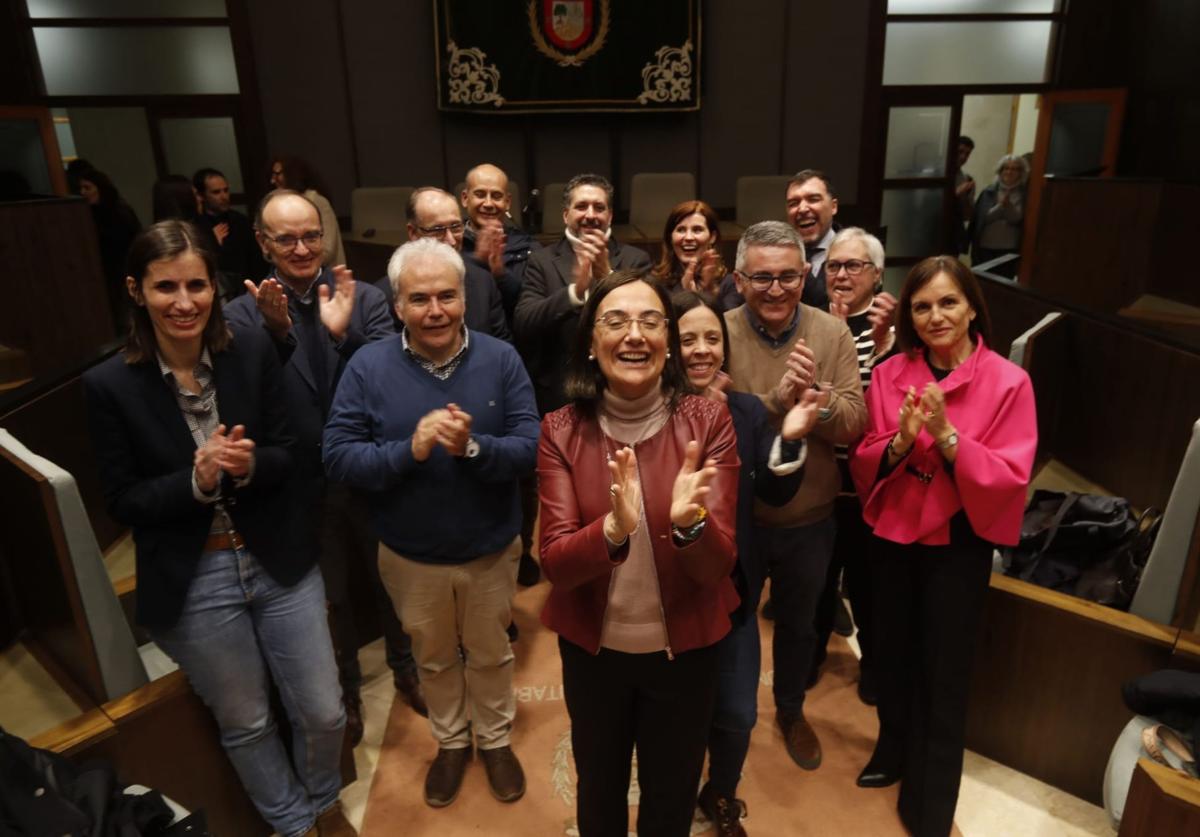 Conchi López junto a su equipo