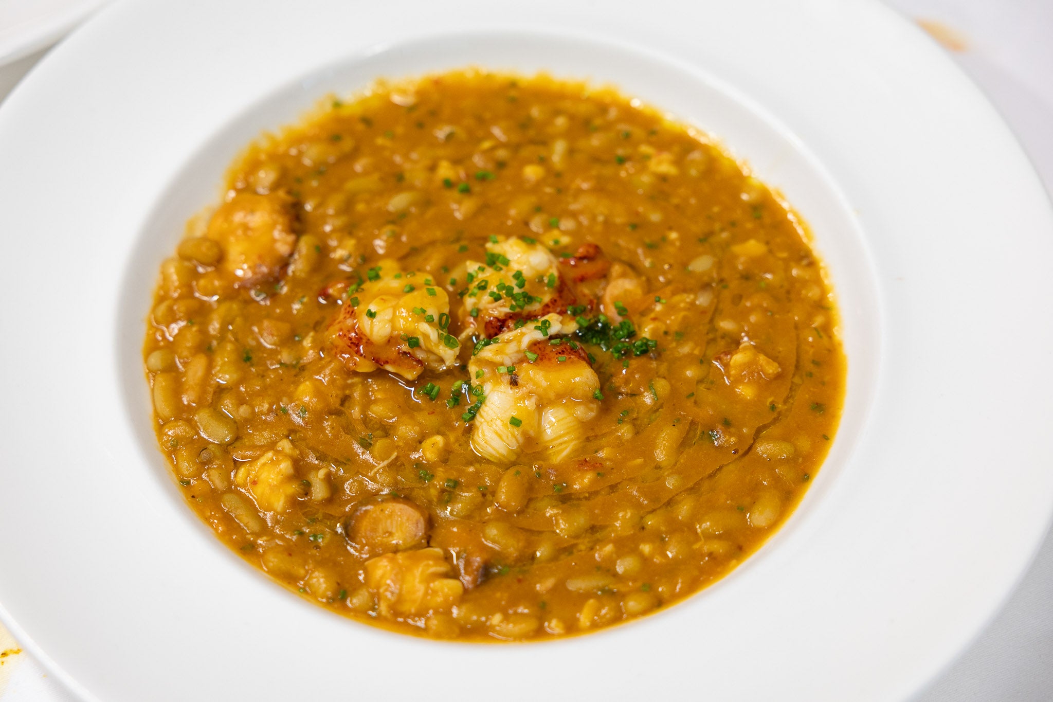 Verdinas con bogavante (El Almacén, Palacio de los Acevedo). Mejor guisote de Cantabria.