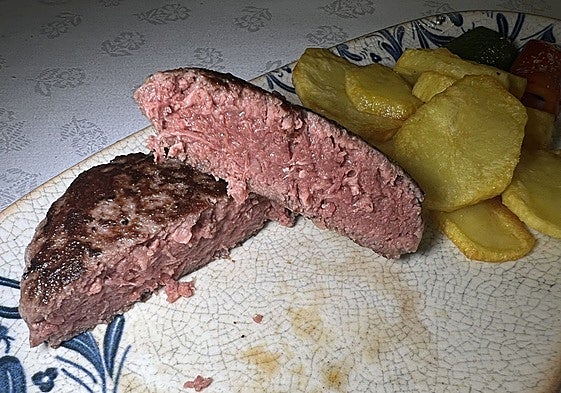 Corte de la nueva de hamburguesa de buey.