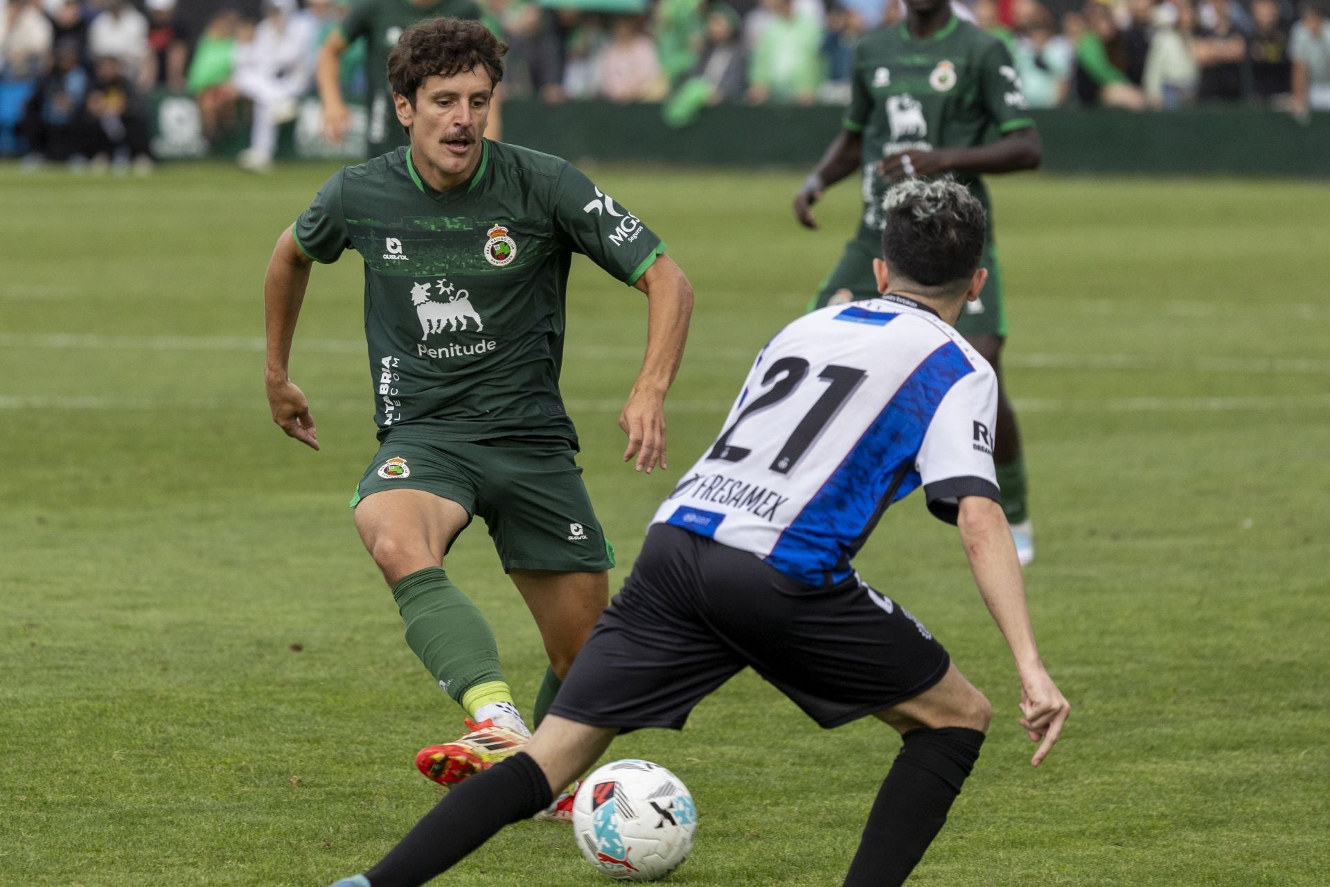La segunda camiseta del Racing, protagonista también del partido.