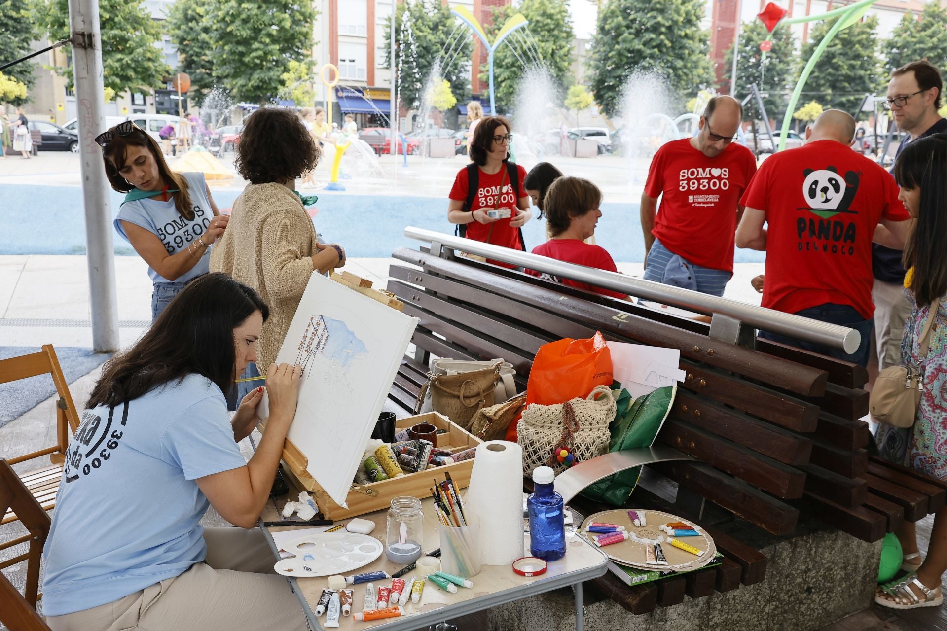 Las peñas con sus camisetas del 39300.