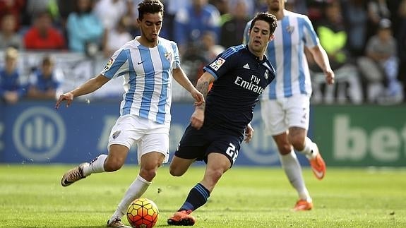 Isco (d), en el partido ante el Málaga. 