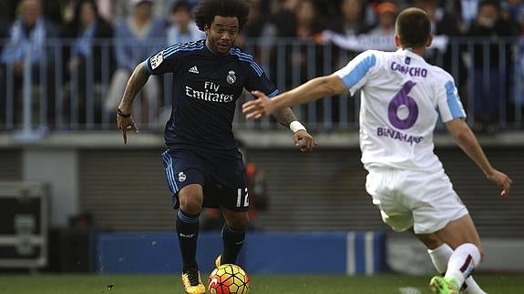 Marcelo (i), en el partido contra el Málaga. 