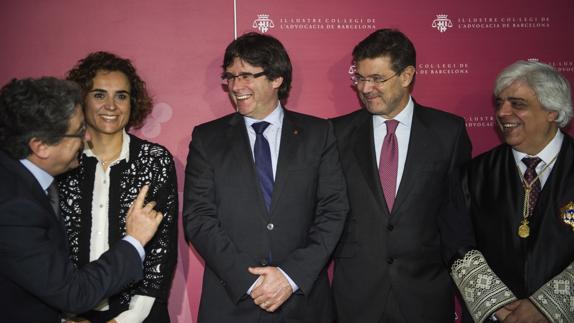 Enric Millo, Dolors Montserrat, Carles Puigdemont y Rafael Catalá.