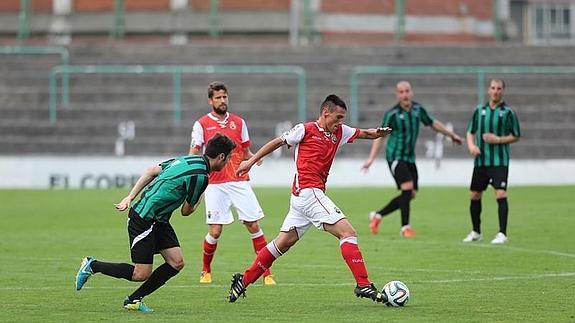 Un lance del partido.