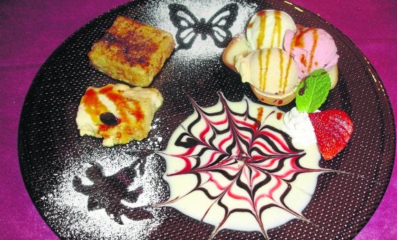 Surtido de postres con puding de sobao, leche frita y helados caseros