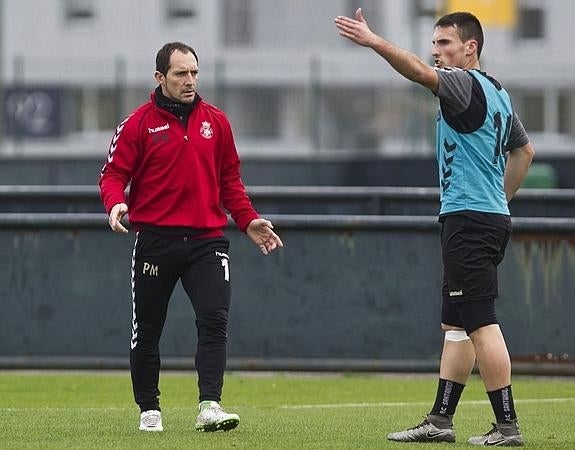 Pedro Munitis, junto a Fede, en un entrenamiento.