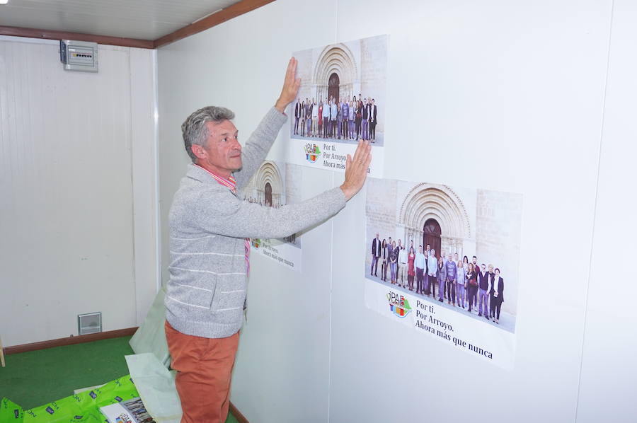 Fotos: Pegada de carteles e inicio de la campaña de las elecciones municipales en Arroyo de la Encomienda