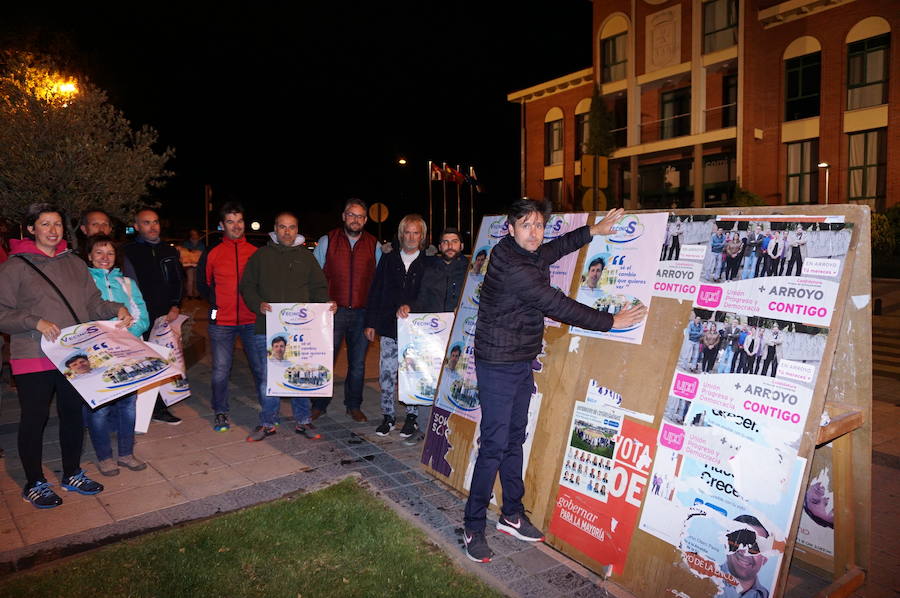 Fotos: Pegada de carteles e inicio de la campaña de las elecciones municipales en Arroyo de la Encomienda