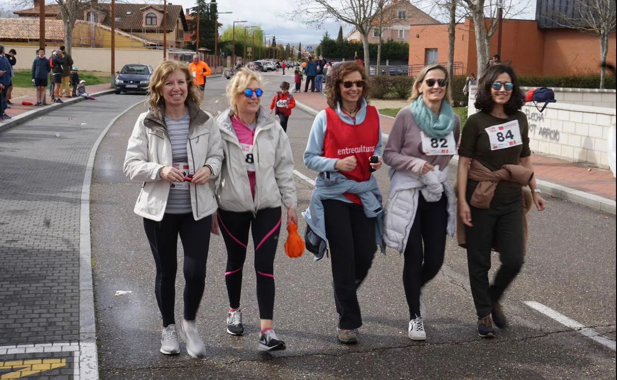 Sonrisas y caras de felicidad en la carrera solidaria de la ONG Entreculturas celebrada en Arroyo de la Encomienda. 