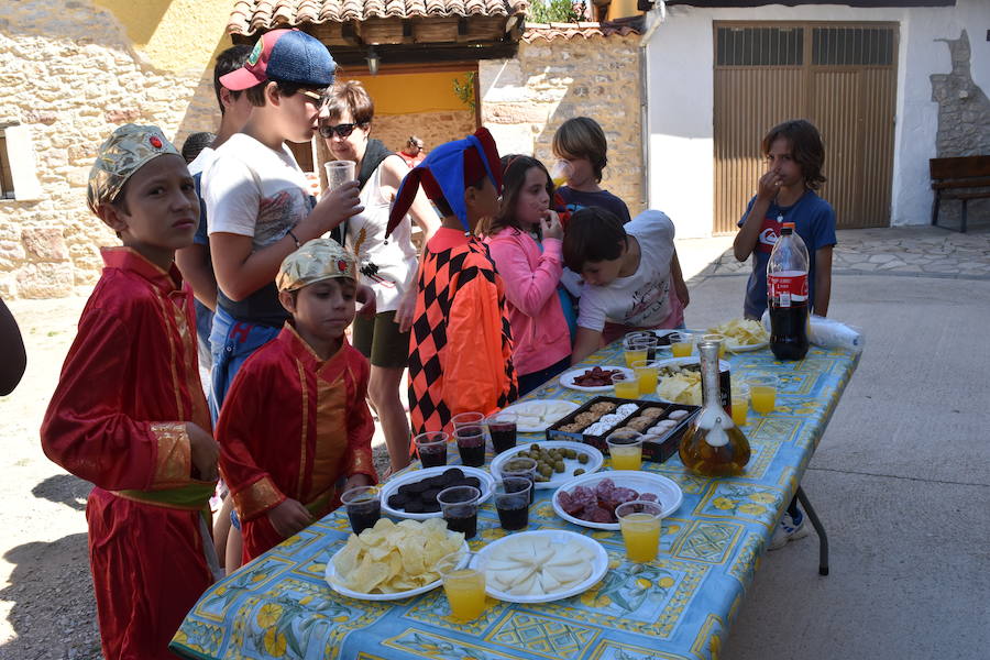 La localidad palentina celebró la fiesta de su patrón, San Lorenzo con un gran recorrido por las calles