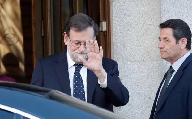 Mariano Rajoy, a la salida del Tribunal Supremo, después de declarar.