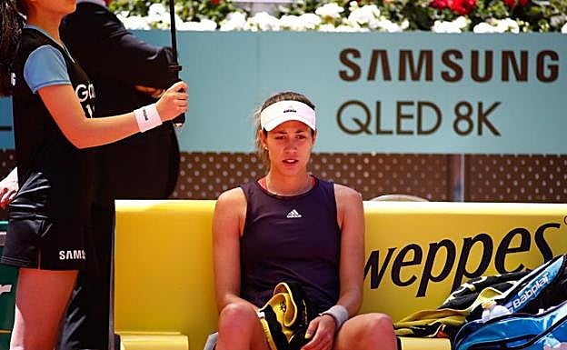Garbiñe Muguruza, durante su primer y último partido en el Mutua Madrid Open.