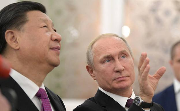 Putin (d) y Jinping. 