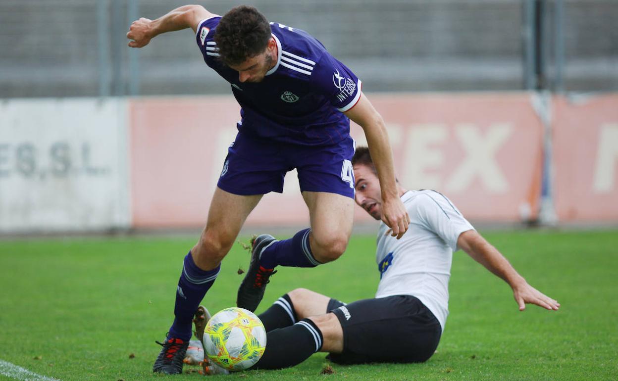 Una acción del partido entre el Real Unión y el Promesas. 