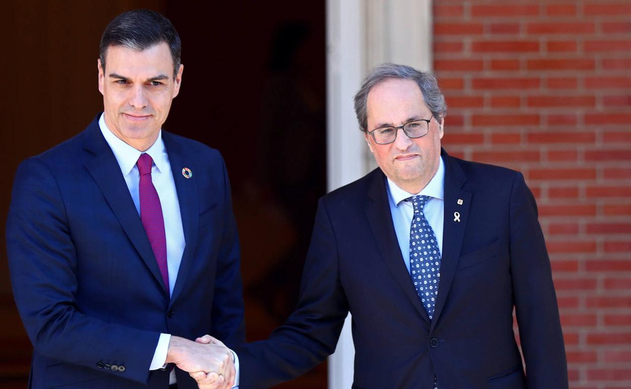 Pedro Sánchez y Quim Torra, en febrero de 2020.