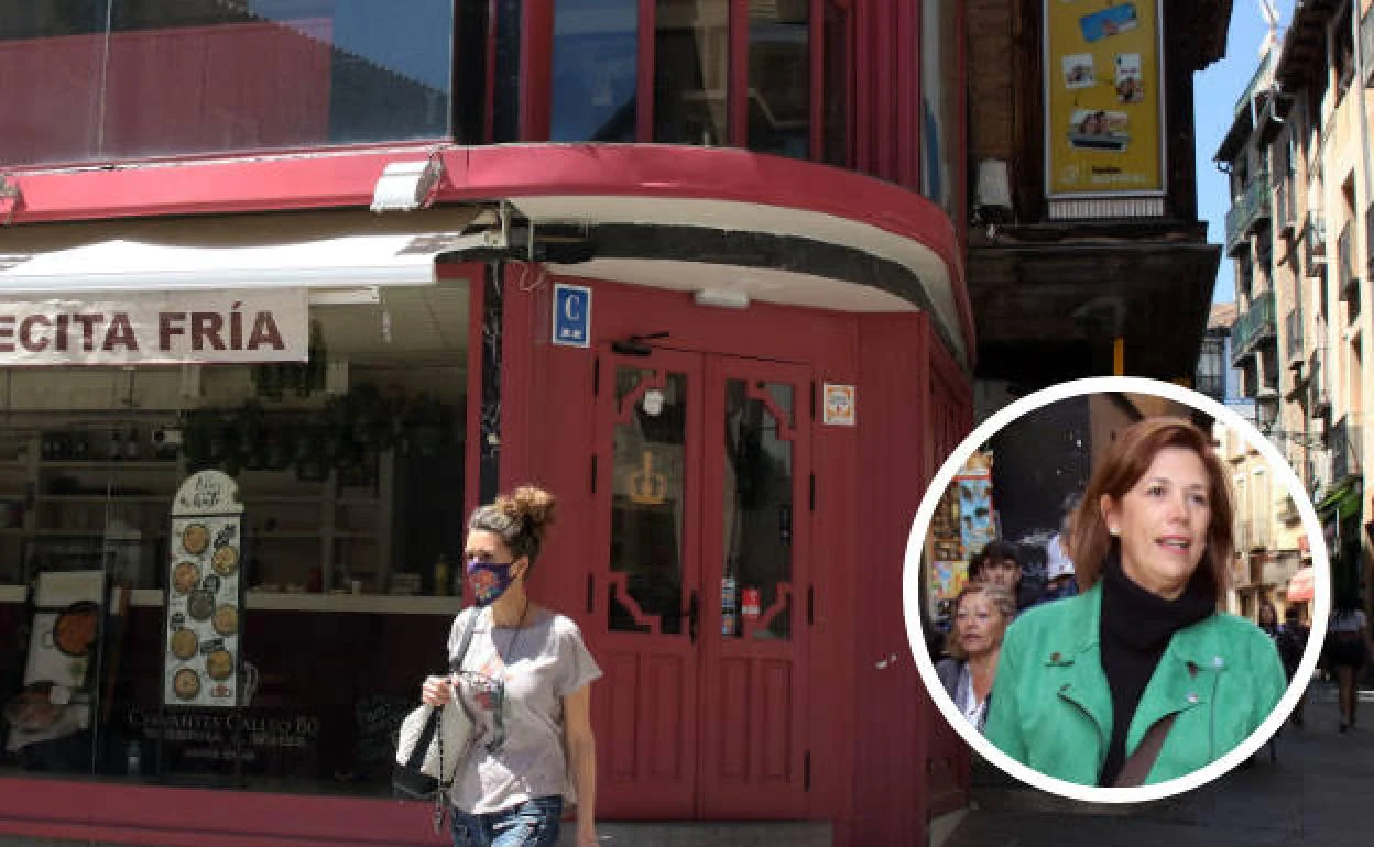 Esther Nuñez y el local de la tarberna en plena Calle Real de Segovia, ya cerrado. 