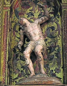 Imagen secundaria 2 - Interior de la iglesia San Mamés; óculo cegado, capilla de los Salcedo y San Sebastián manierista.