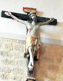 Imagen secundaria 2 - Arriba, monumento dedicado a la Batalla de Villalar; abajo, iglesia de San Juan Bautista y Cristo de las Aguas. .