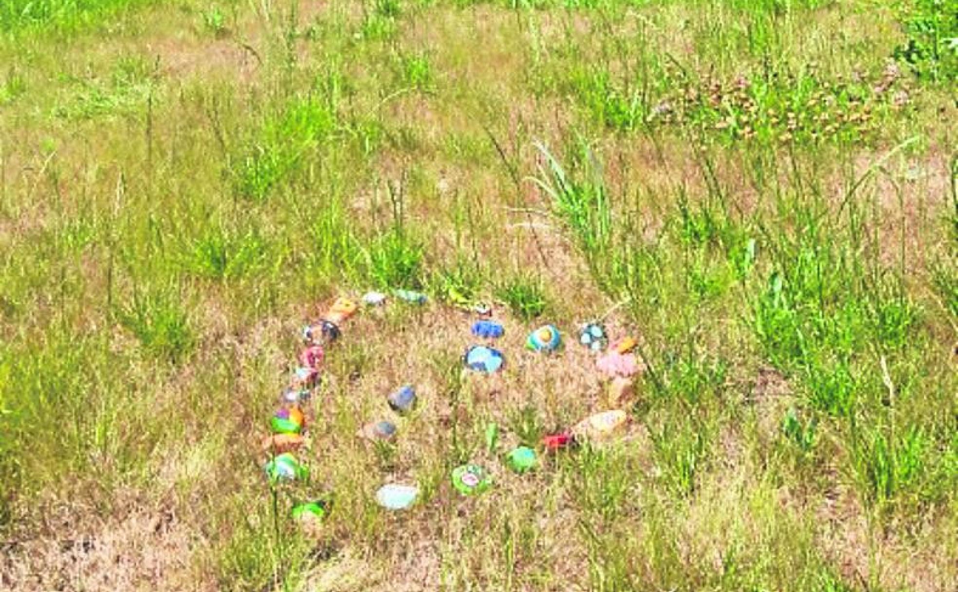 Corazón hecho con piedras en la rotonda del Río Carrión..
