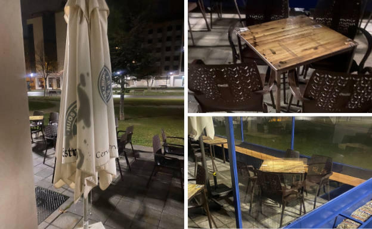 Tela de la sombrilla y mesas salpicadas por el aceite arrojado, hace unos días. 