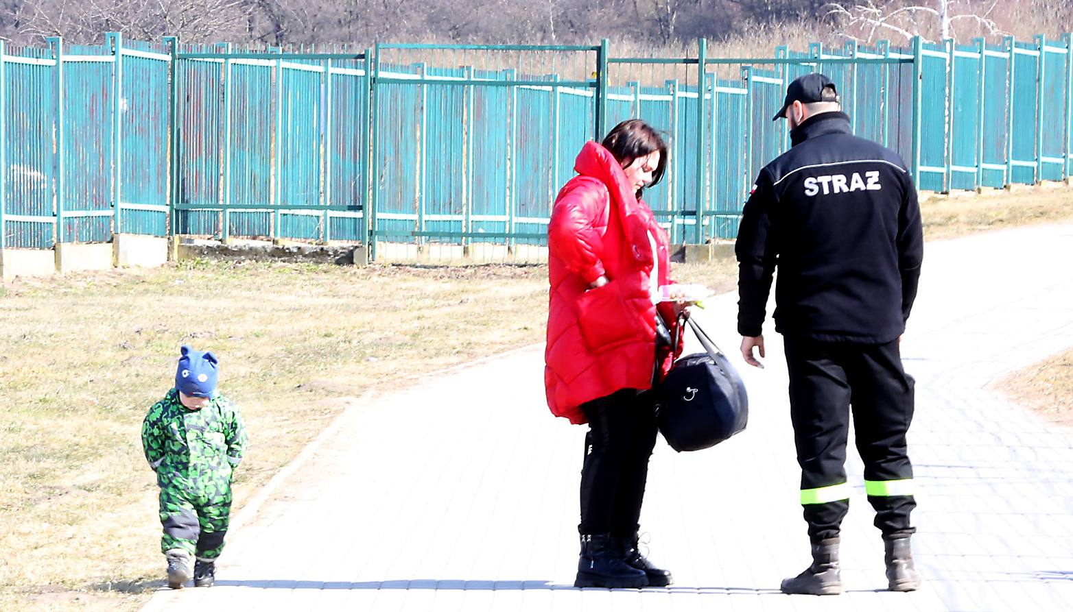 Refugiados ucranianos en la frontera entre Ucrania y Polonia.