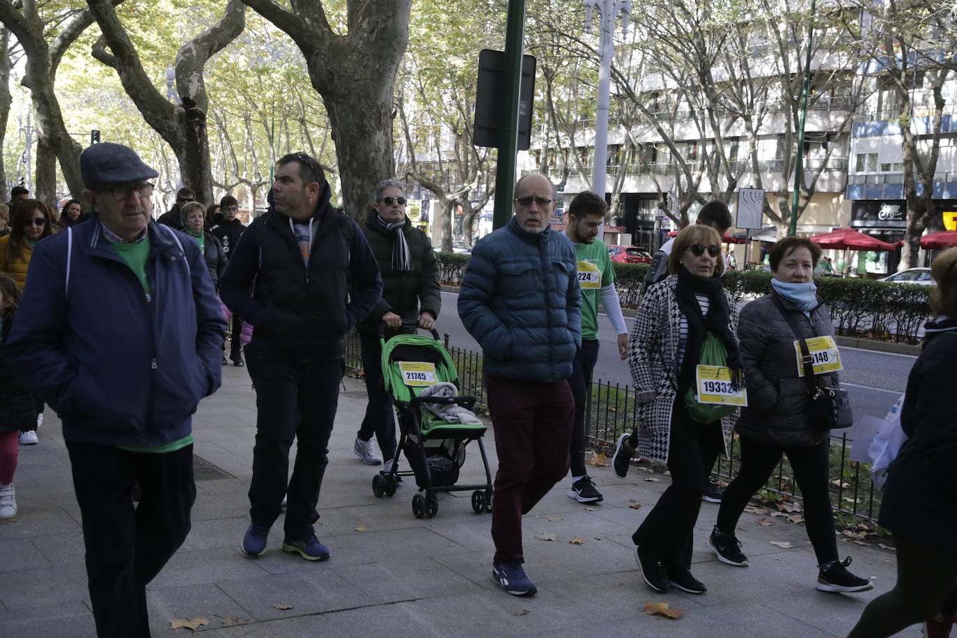 Fotos: La marcha contra el cáncer llena Valladolid de verde